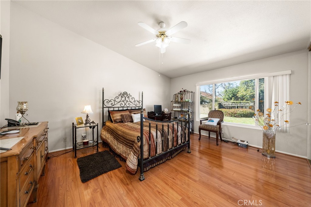 1869 Sugarloaf Avenue Upland, CA 91784 - Photo 18 of 41 a living room with furniture and a large window