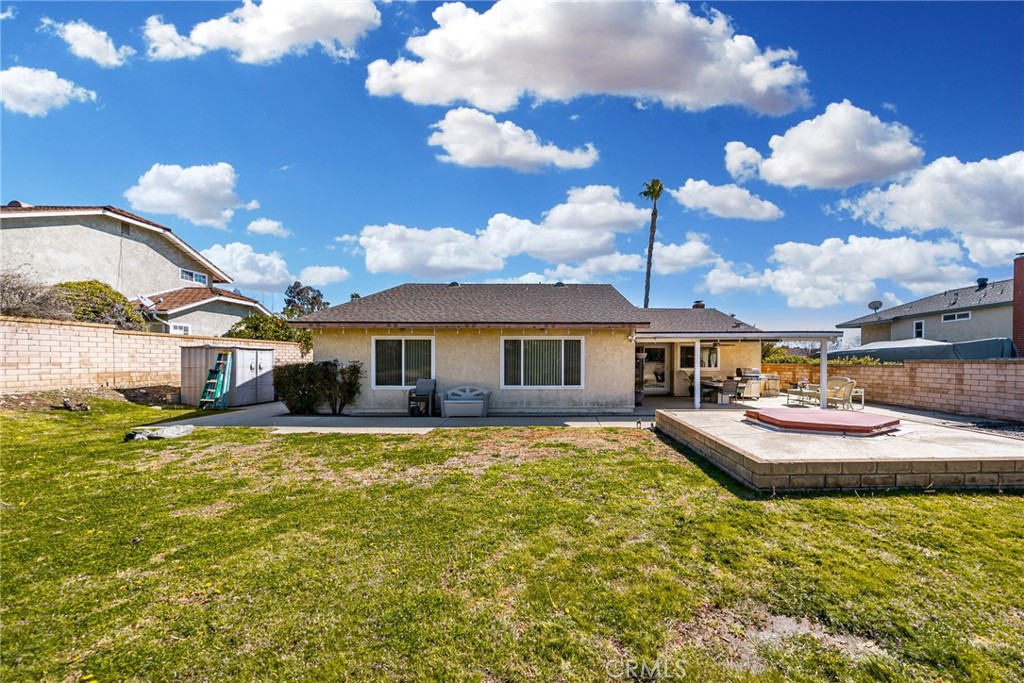 1869 Sugarloaf Avenue Upland, CA 91784 - Photo 28 of 41 a front view of a house with garden