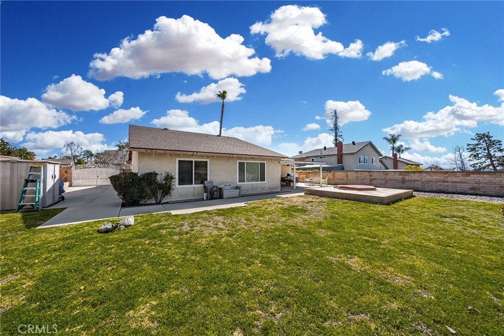 1869 Sugarloaf Avenue Upland, CA 91784 - Photo 29 of 41 a front view of a house with garden