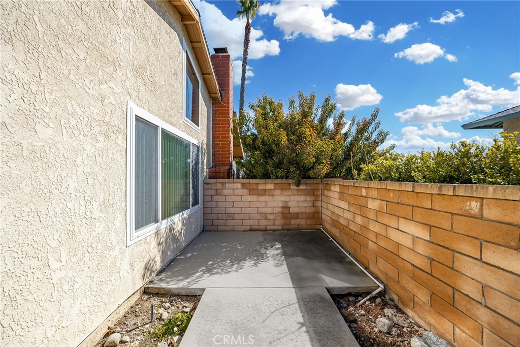 1869 Sugarloaf Avenue Upland, CA 91784 - Photo 34 of 41 a view of balcony with wooden floor and fence