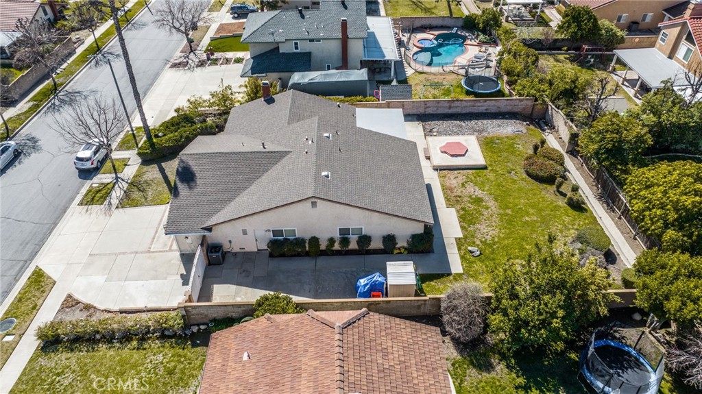 1869 Sugarloaf Avenue Upland, CA 91784 - Photo 36 of 41 an aerial view of a house with a swimming pool