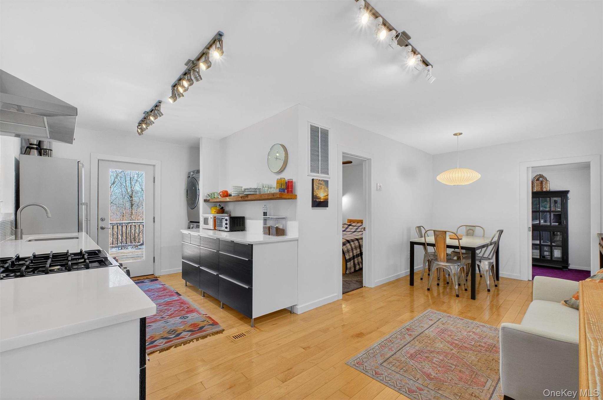208 Ressique Road Carmel, NY 10512 - Photo 11 of 40 Light pine flooring extends to dining area