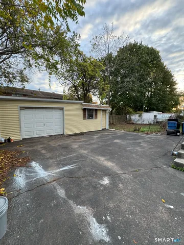 a view of a house with a garage