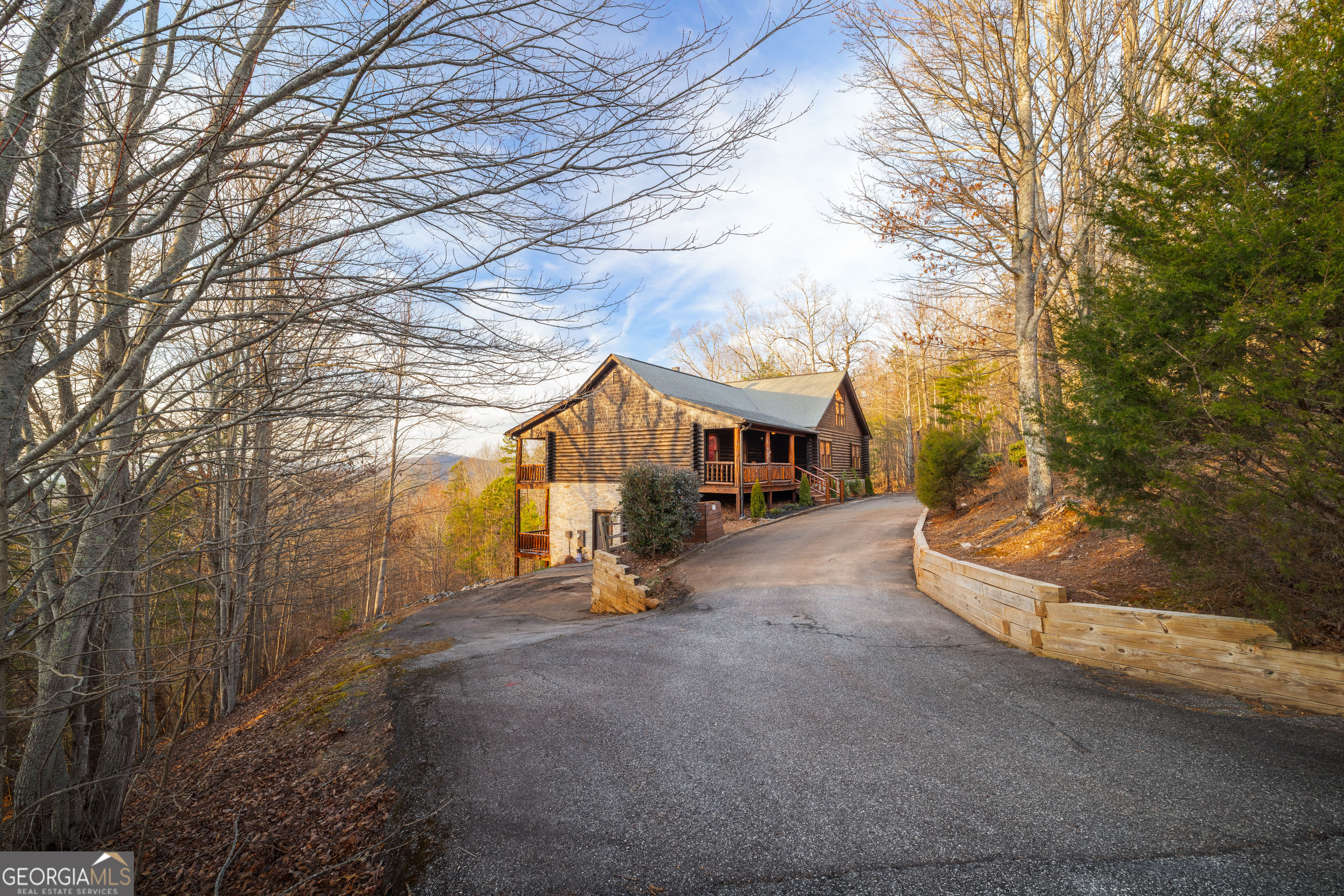 180 Cinnamon Bear Road Mineral Bluff, GA 30559 - Photo 11 of 49 a view of a house with a large tree and a yard