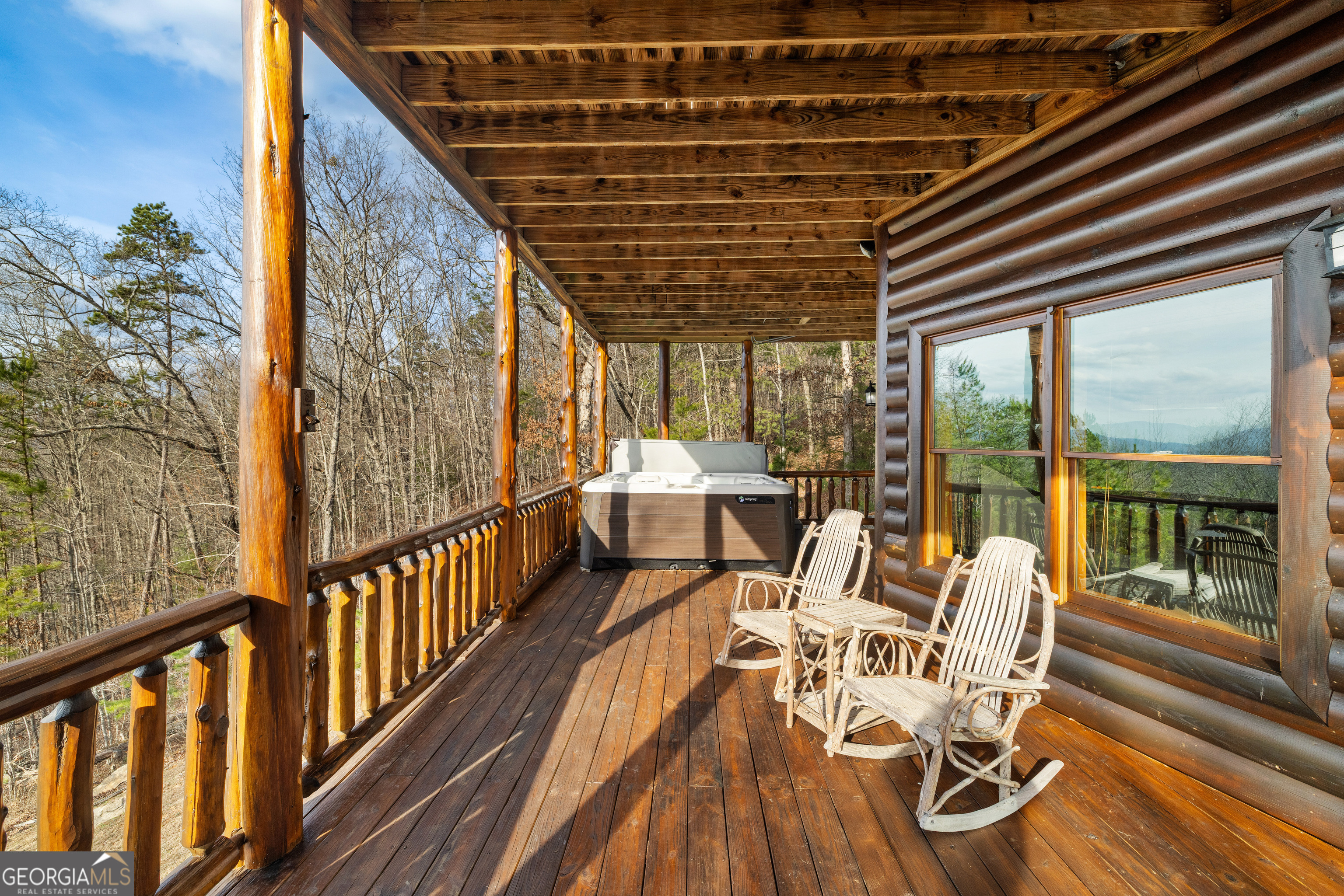 180 Cinnamon Bear Road Mineral Bluff, GA 30559 - Photo 15 of 49 a view of a chairs and table in the balcony