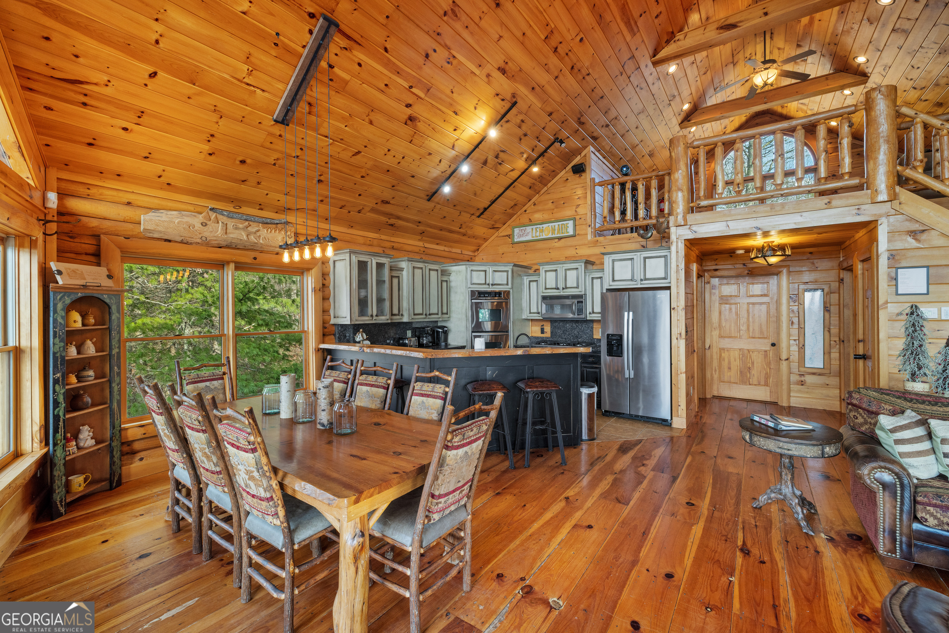 180 Cinnamon Bear Road Mineral Bluff, GA 30559 - Photo 31 of 49 a view of a patio with table and chairs