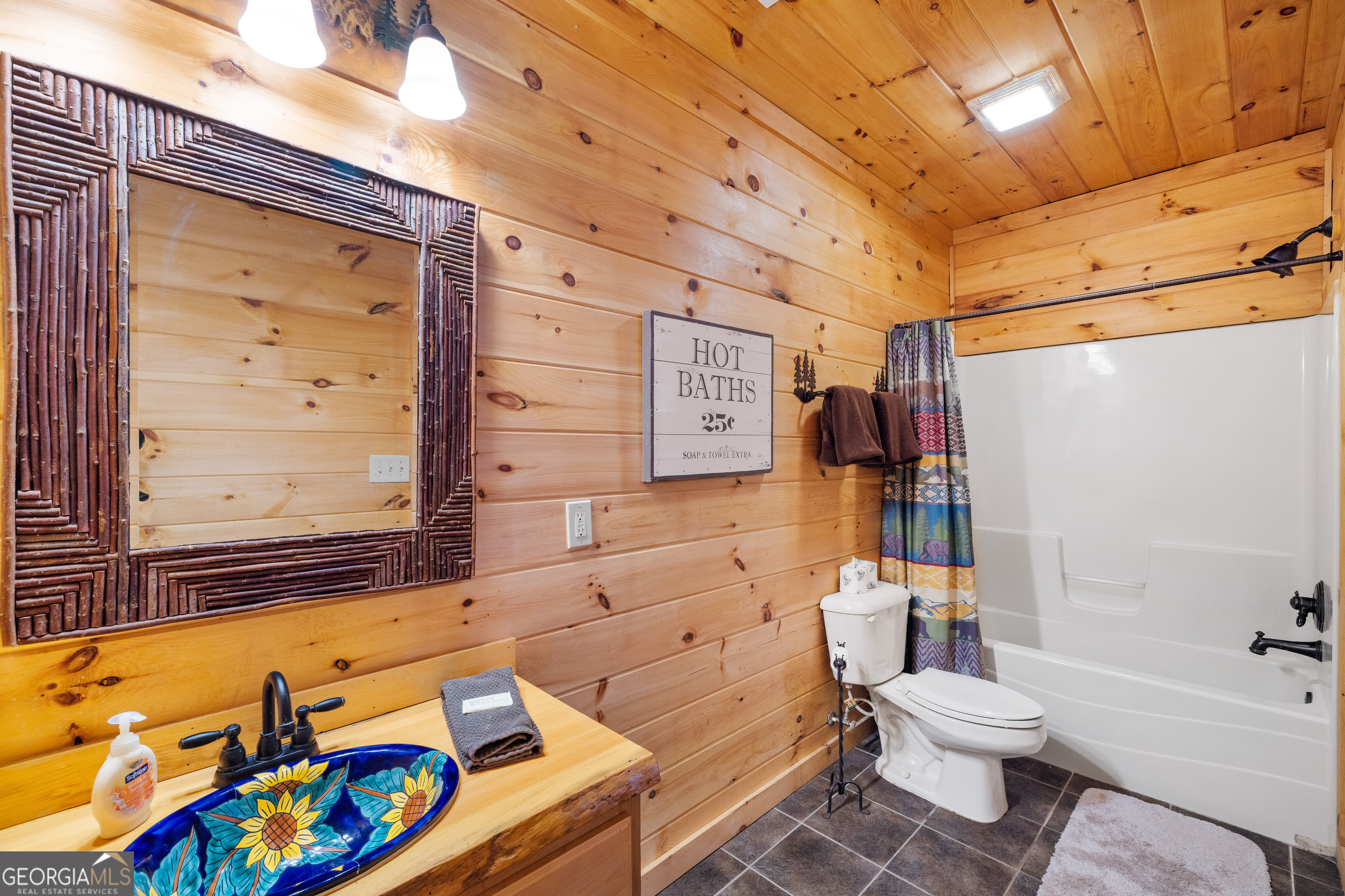 180 Cinnamon Bear Road Mineral Bluff, GA 30559 - Photo 40 of 49 a bathroom with a sink a toilet and bathtub