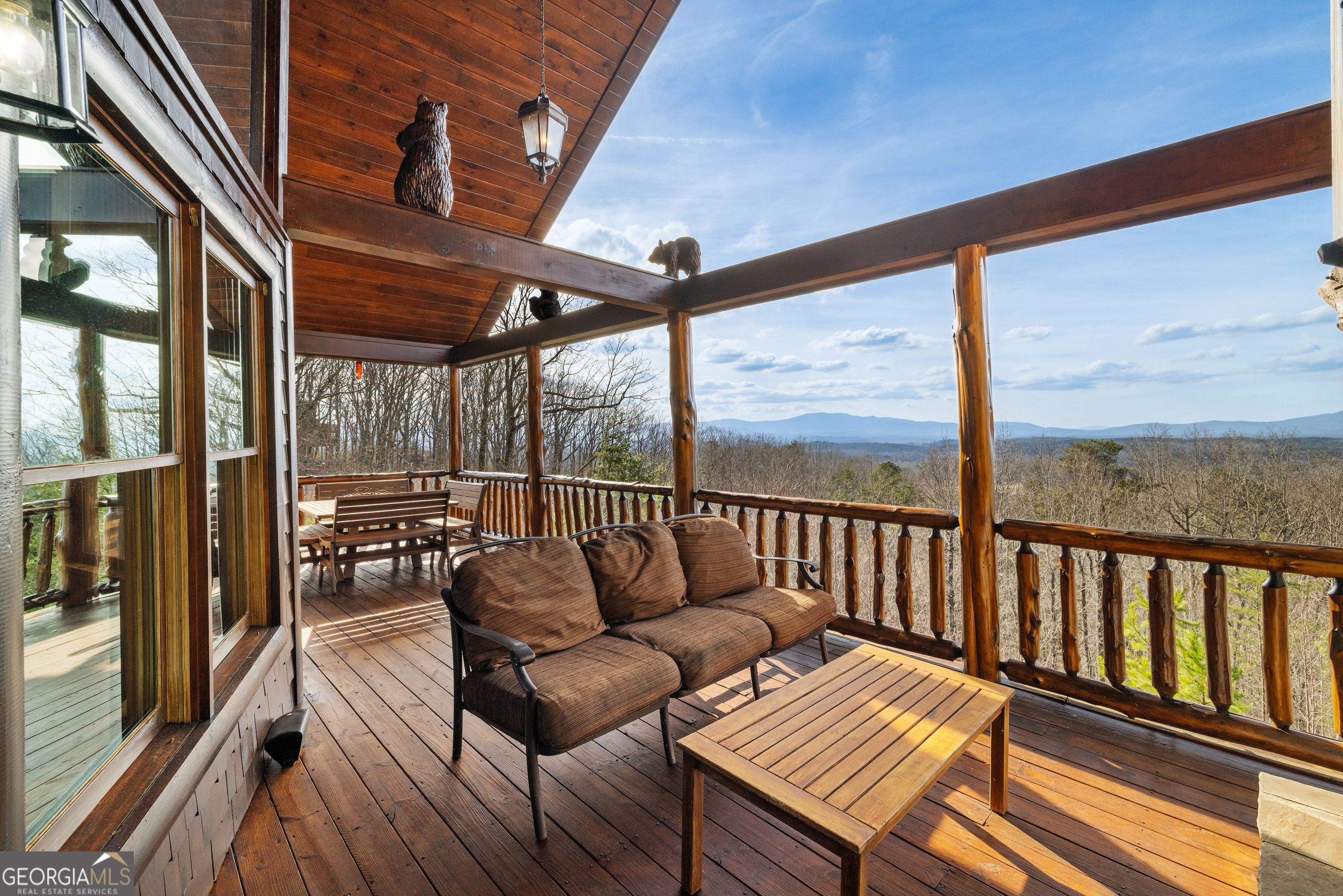 180 Cinnamon Bear Road Mineral Bluff, GA 30559 - Photo 6 of 49 a balcony with wooden floor