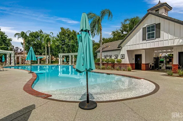 a view of a house with swimming pool