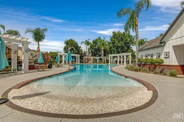 swimming pool view with a outdoor space
