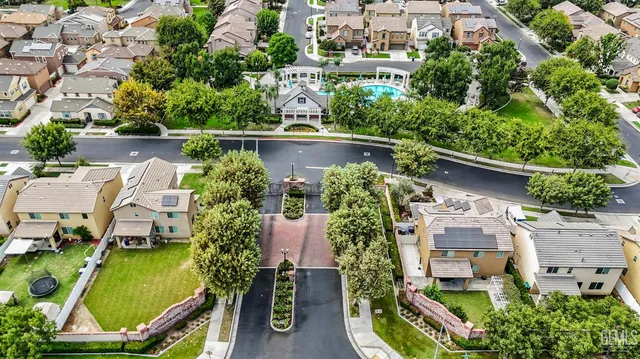 an aerial view of a house with outdoor space