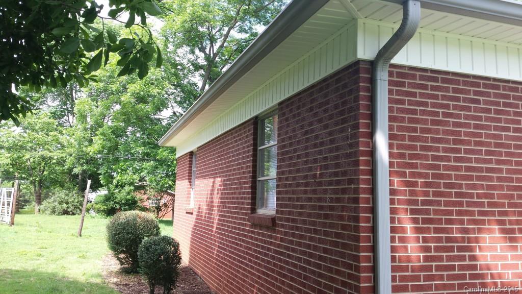 87 Lee Road Stony Point, NC 28678 - Photo 3 of 24 a view of brick wall in front of a building