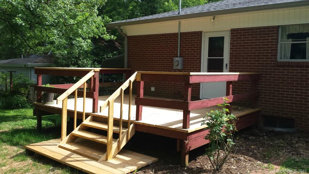 87 Lee Road Stony Point, NC 28678 - Photo 8 of 24 a view of house with a chairs in balcony