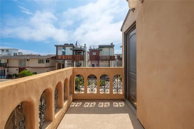 a view of balcony with furniture