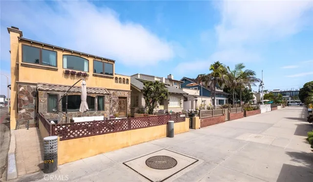 a swimming pool view with a outdoor seating