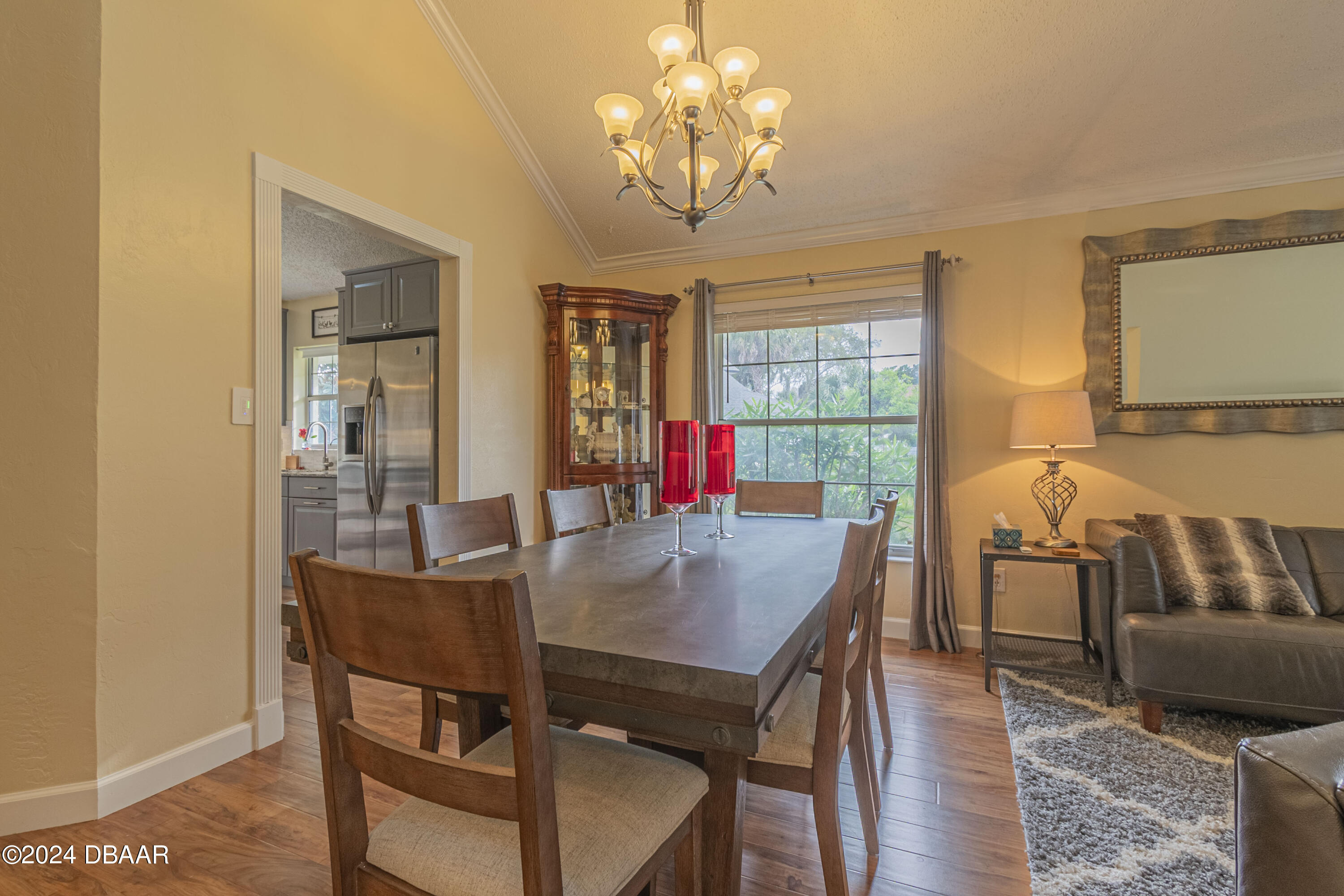 6236 Clover Bend Drive Port Orange, FL 32127 - Photo 11 of 73 a view of a dining room with furniture window and outside view