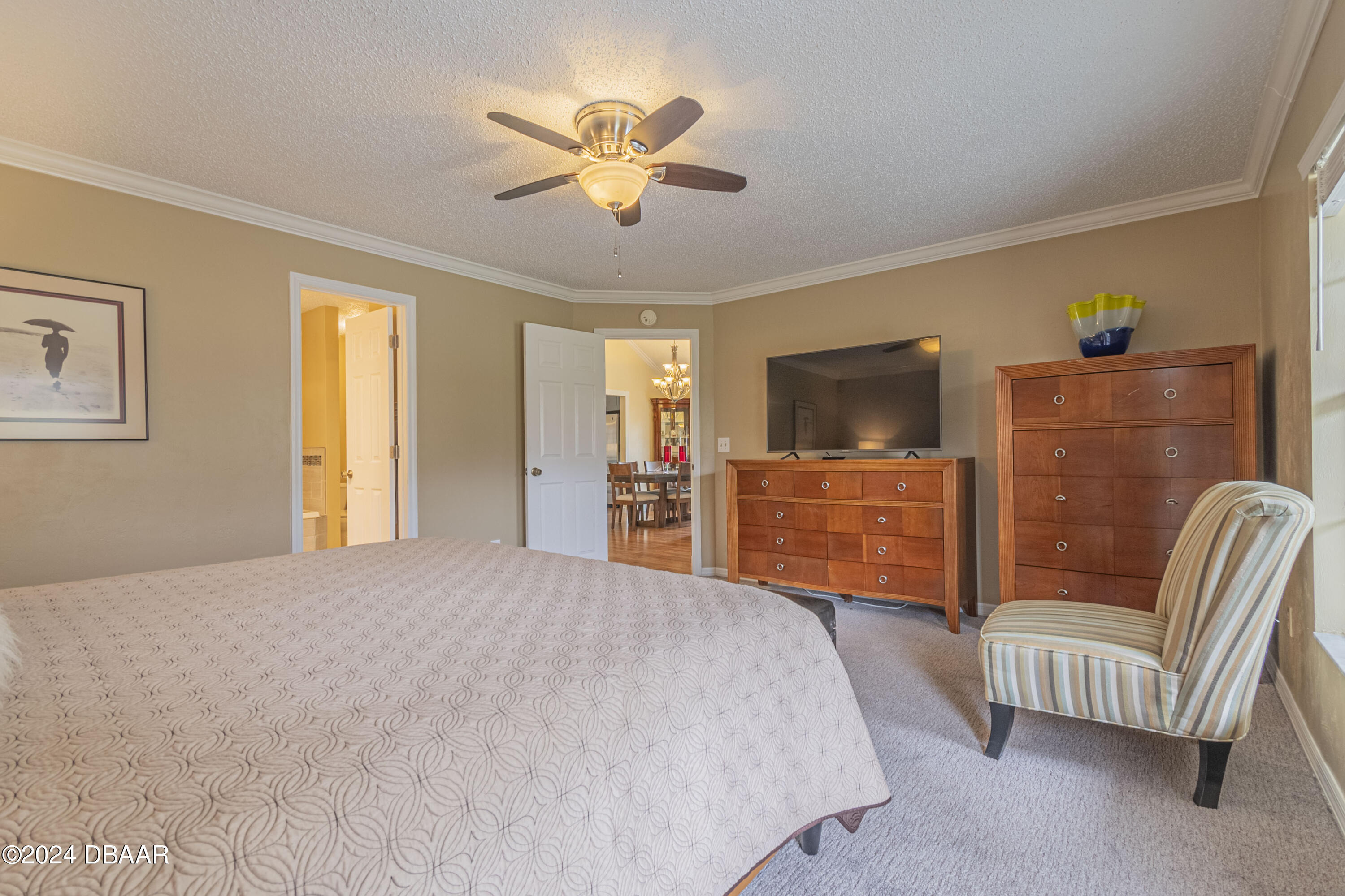 6236 Clover Bend Drive Port Orange, FL 32127 - Photo 25 of 73 a bedroom with a bed and a flat screen tv