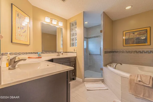 a view of a house with a yard porch and sitting area