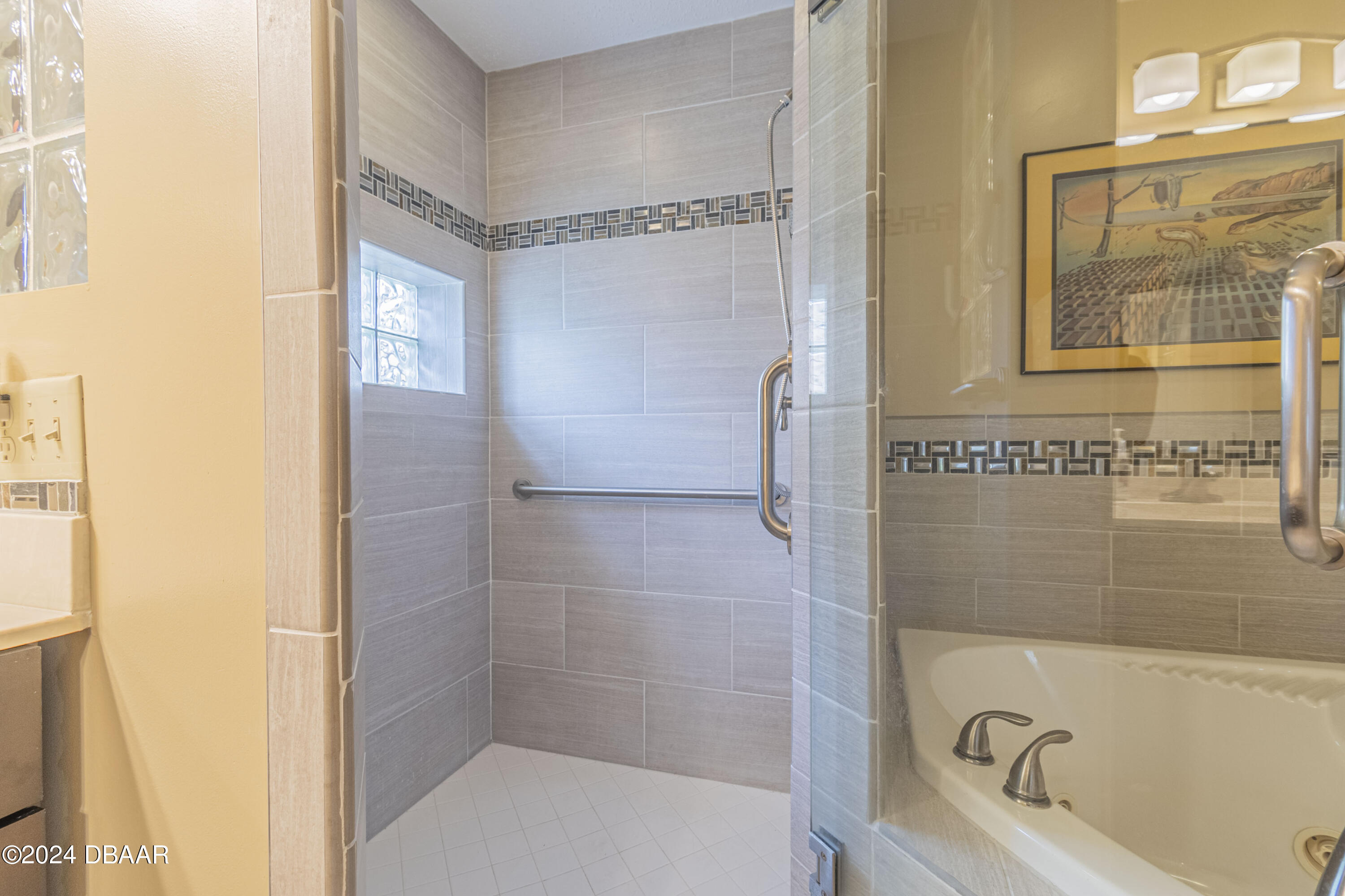 6236 Clover Bend Drive Port Orange, FL 32127 - Photo 45 of 73 a bathroom with a tub and shower