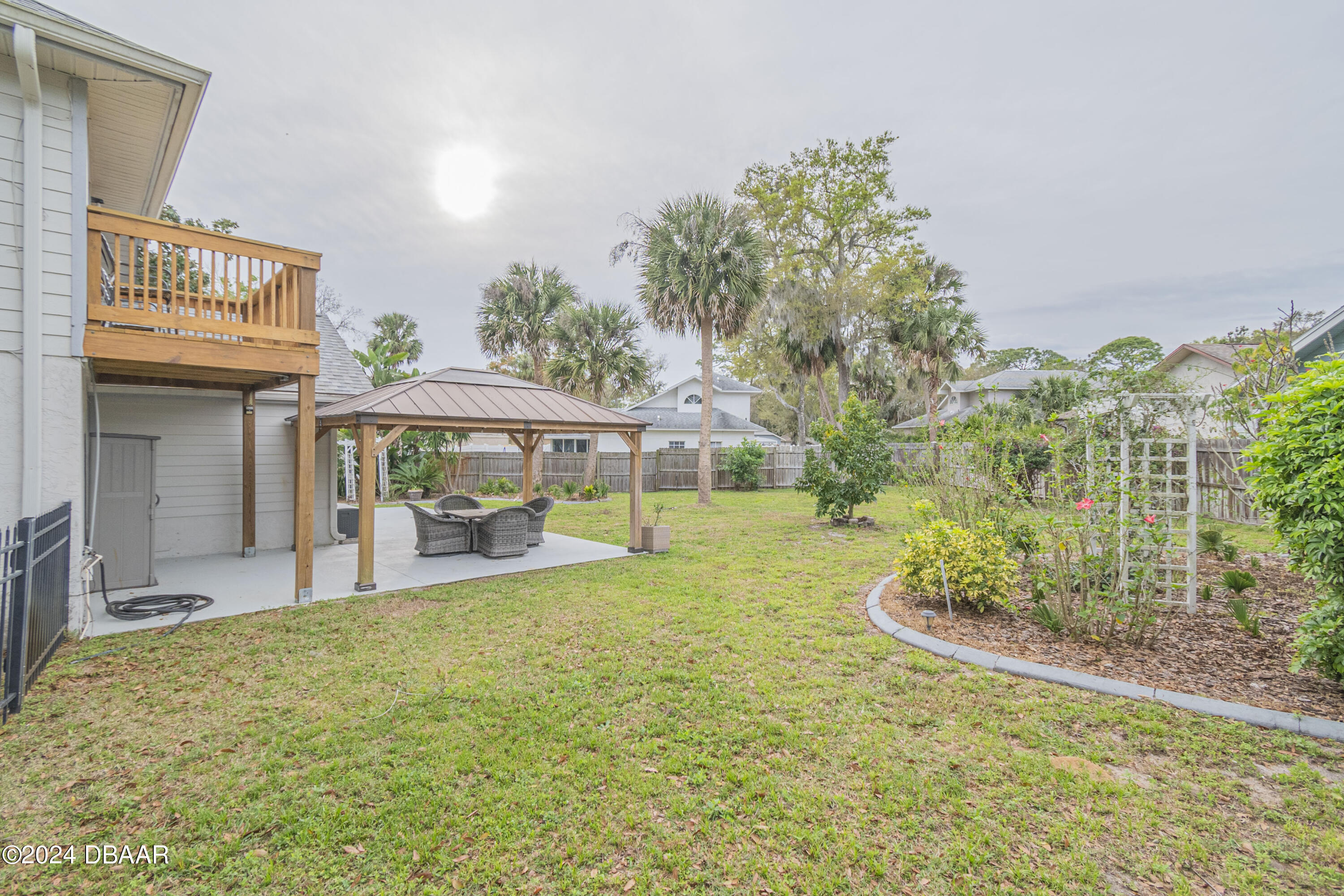 6236 Clover Bend Drive Port Orange, FL 32127 - Photo 53 of 73 a view of a house with a yard porch and sitting area