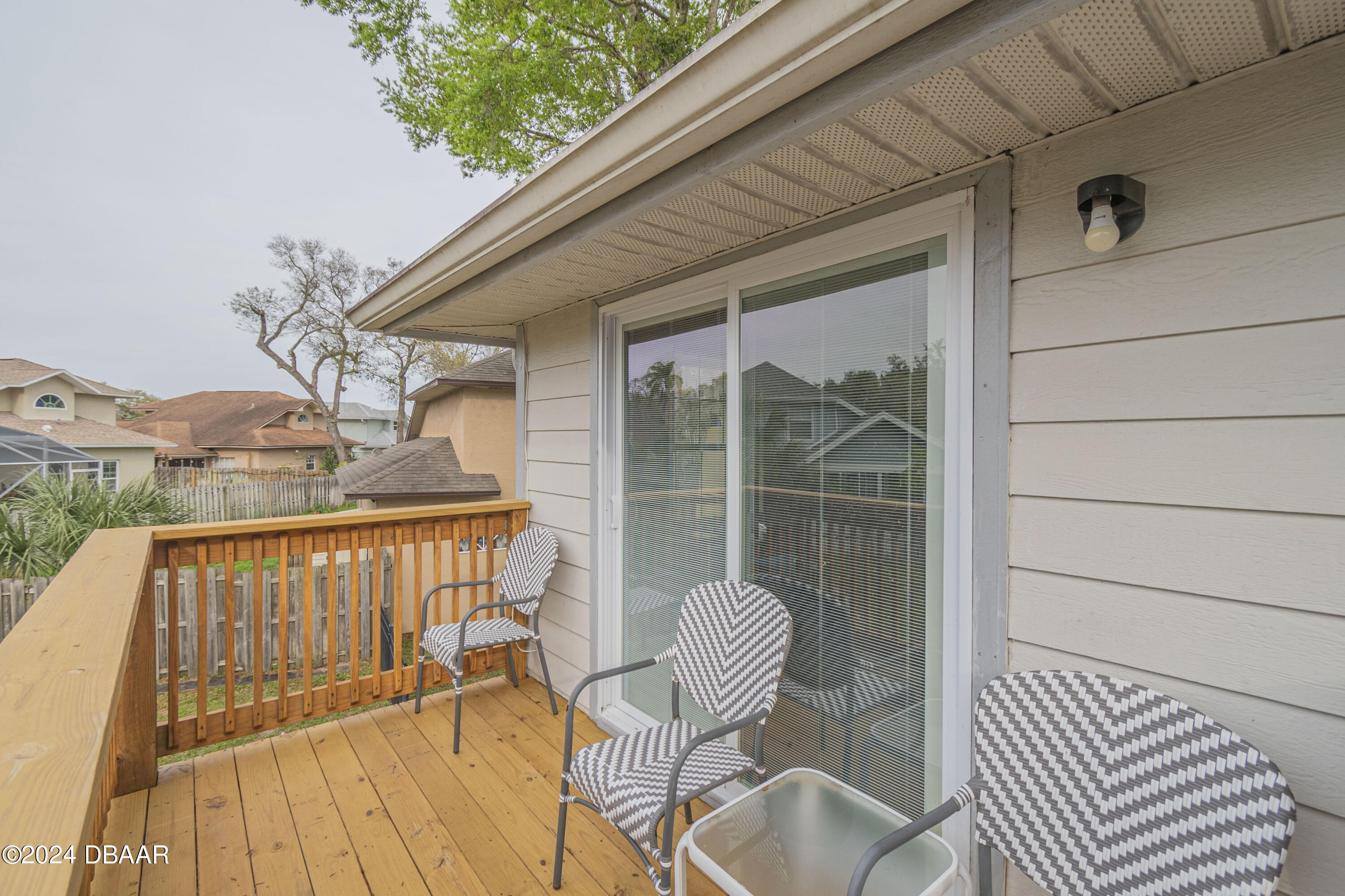 6236 Clover Bend Drive Port Orange, FL 32127 - Photo 57 of 73 a balcony with table and chairs
