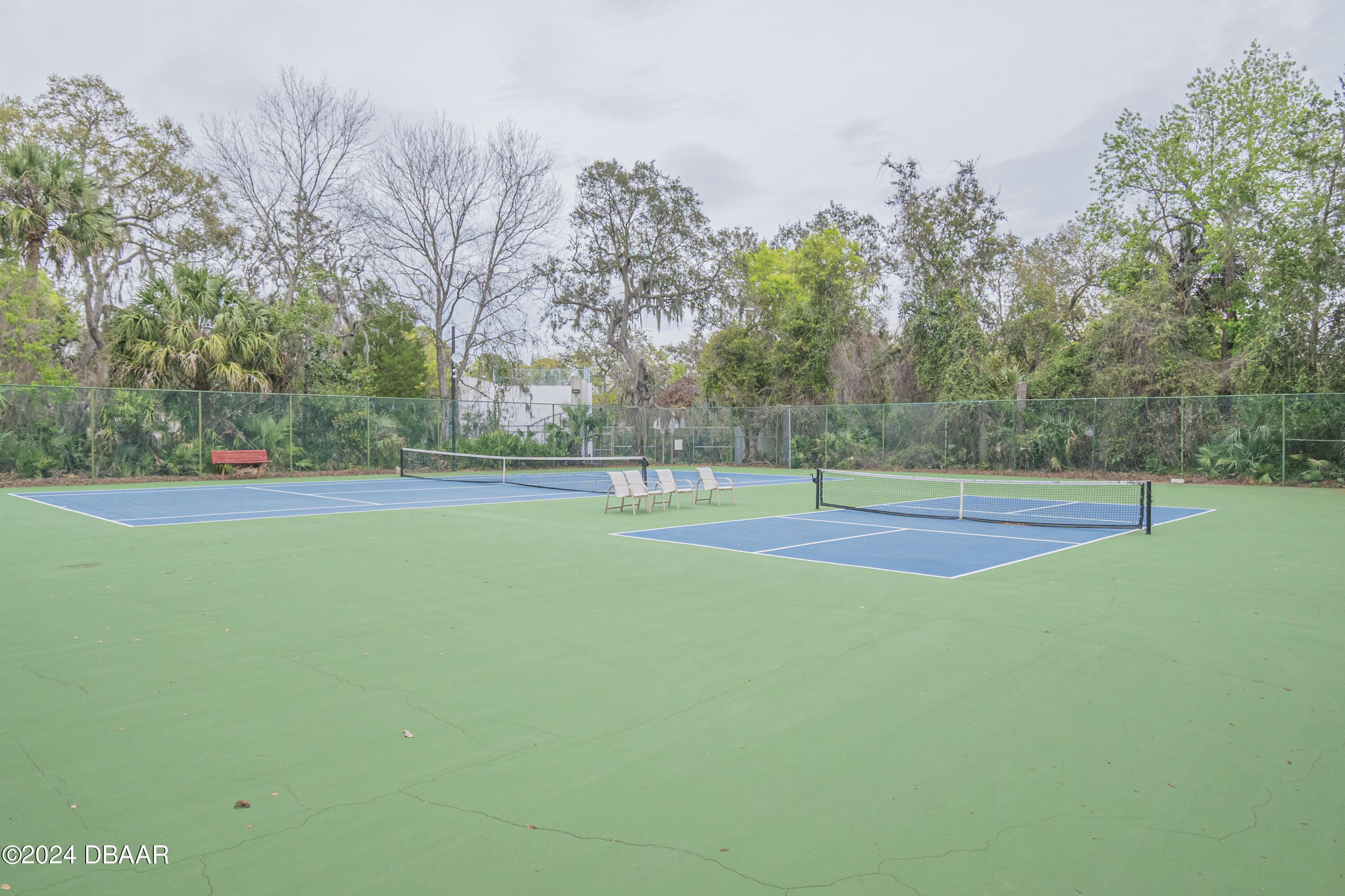 6236 Clover Bend Drive Port Orange, FL 32127 - Photo 66 of 73 a view of a playground and basketball court