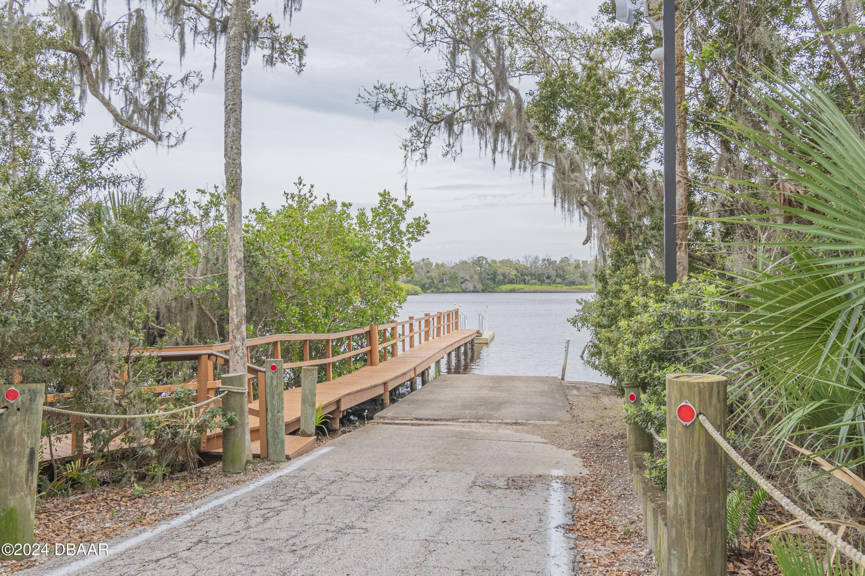 6236 Clover Bend Drive Port Orange, FL 32127 - Photo 68 of 73 a view of a pathway of the house and lake view