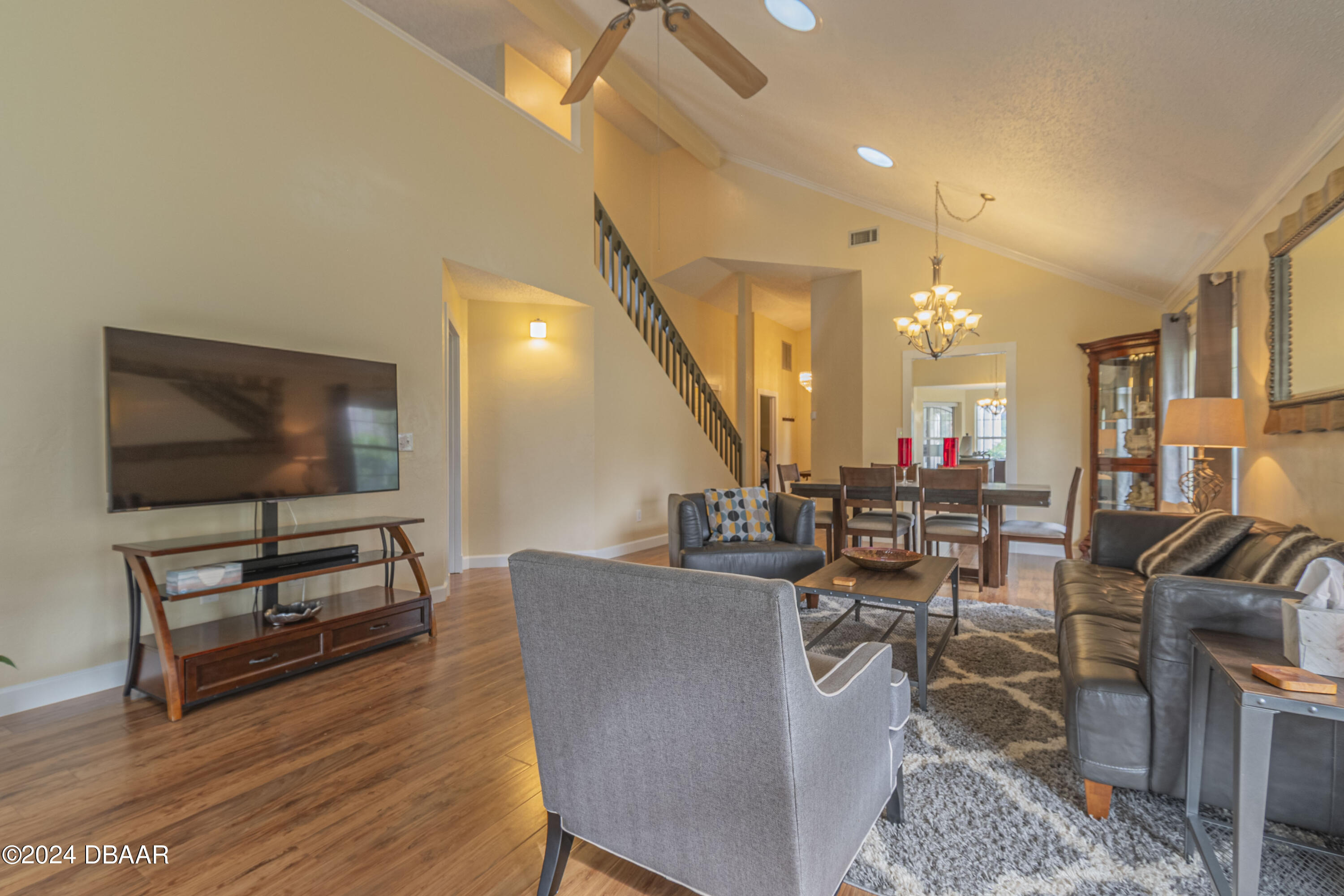 6236 Clover Bend Drive Port Orange, FL 32127 - Photo 7 of 73 a living room with furniture and a flat screen tv