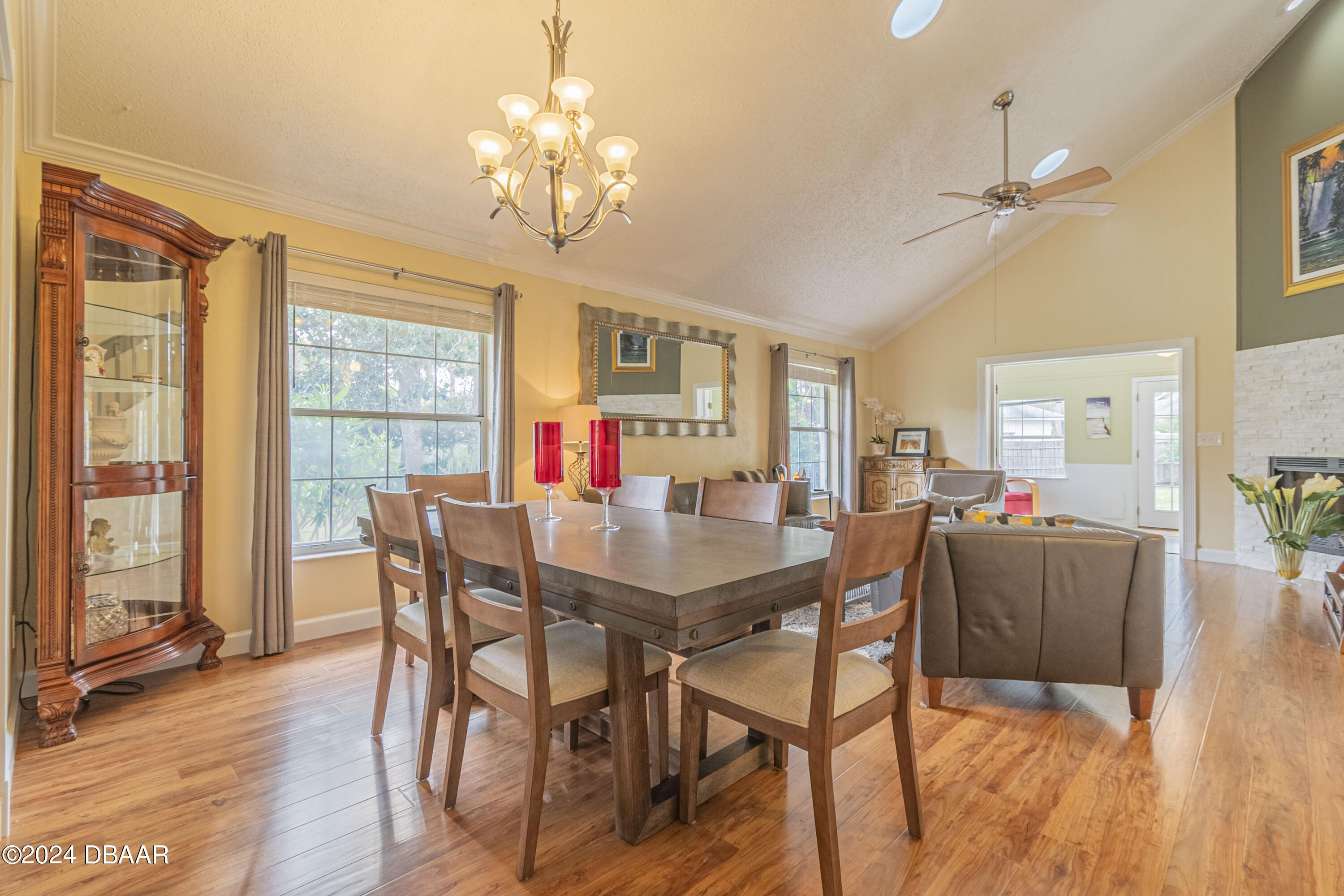6236 Clover Bend Drive Port Orange, FL 32127 - Photo 10 of 73 a view of a dining room with furniture window and wooden floor