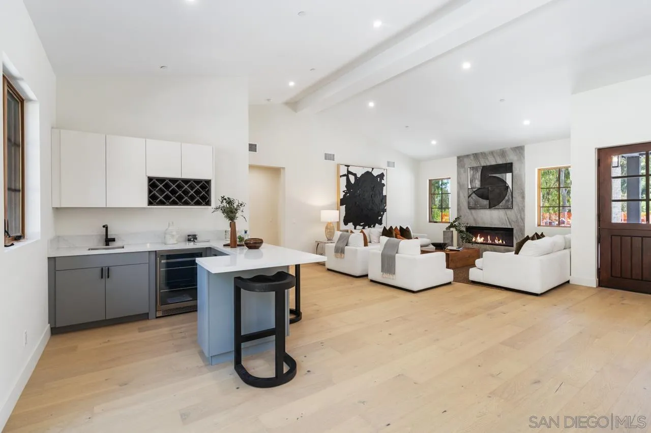 15245 El Camino Real Rancho Santa Fe, CA 92067 - Photo 14 of 41 a living room with furniture flat screen tv and window