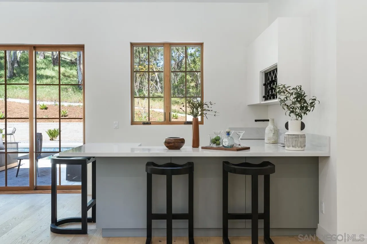 15245 El Camino Real Rancho Santa Fe, CA 92067 - Photo 16 of 41 a view of a sink and chair in a room