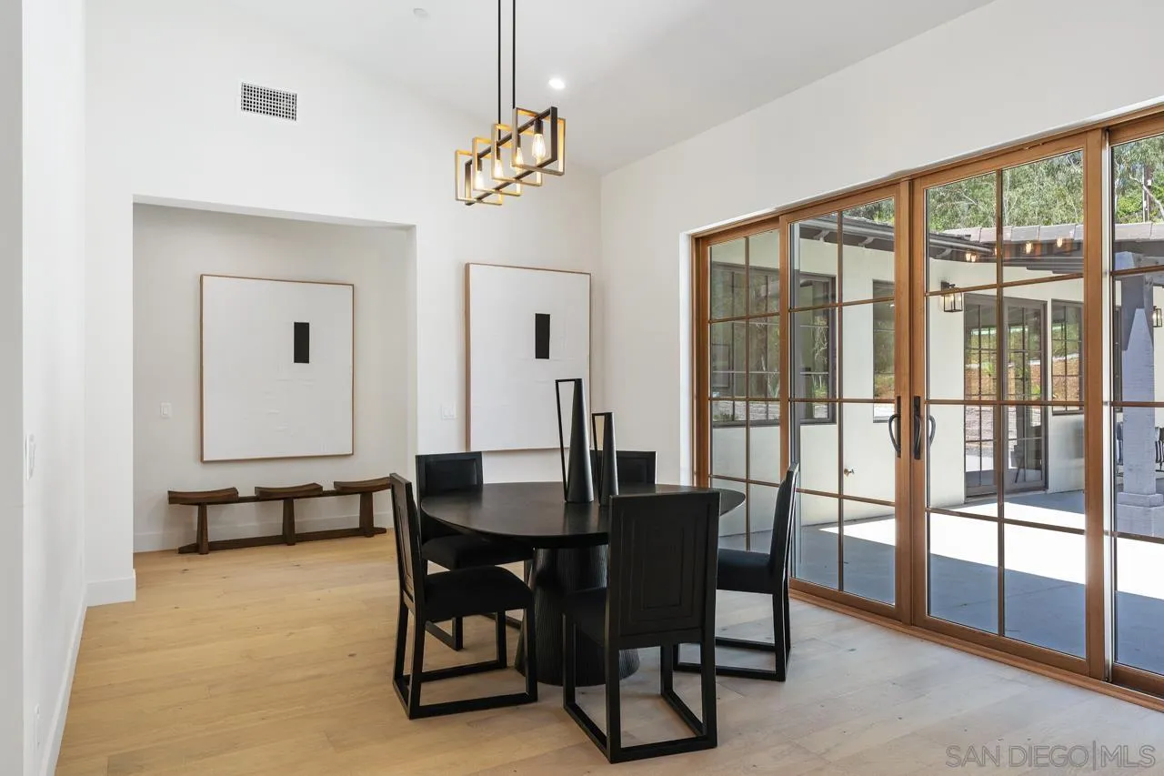 15245 El Camino Real Rancho Santa Fe, CA 92067 - Photo 19 of 41 a view of a dining room with furniture window and outside view