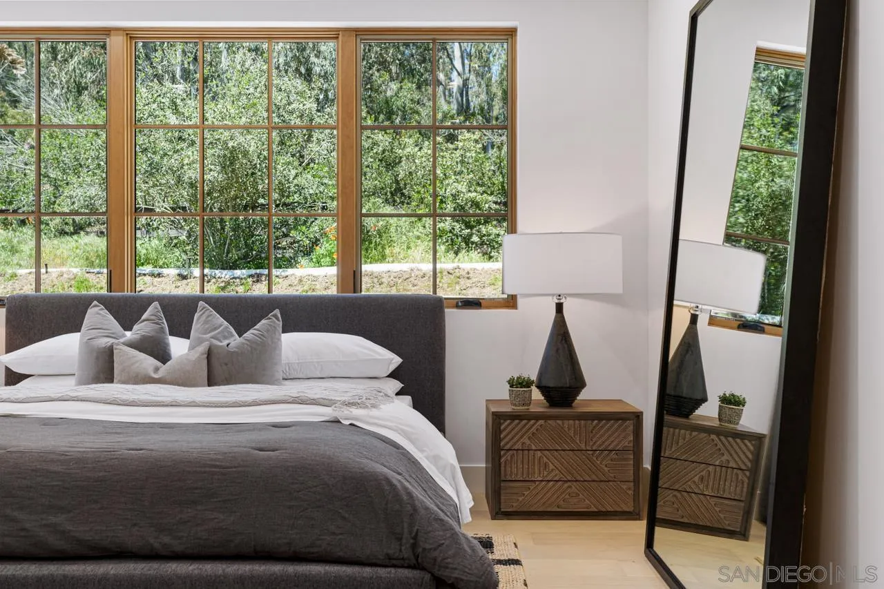 15245 El Camino Real Rancho Santa Fe, CA 92067 - Photo 26 of 41 a living room with furniture and a window