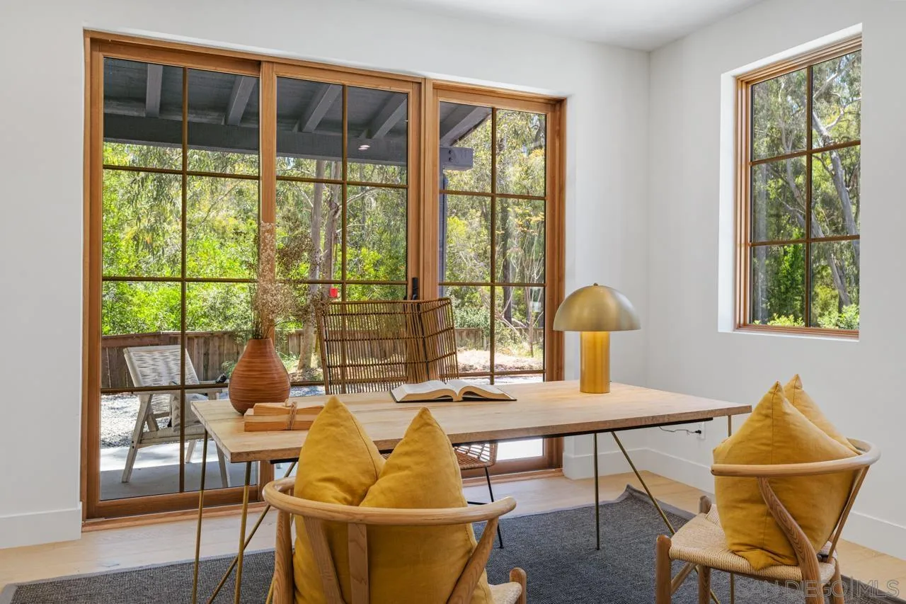 15245 El Camino Real Rancho Santa Fe, CA 92067 - Photo 35 of 41 a living room with furniture and a window
