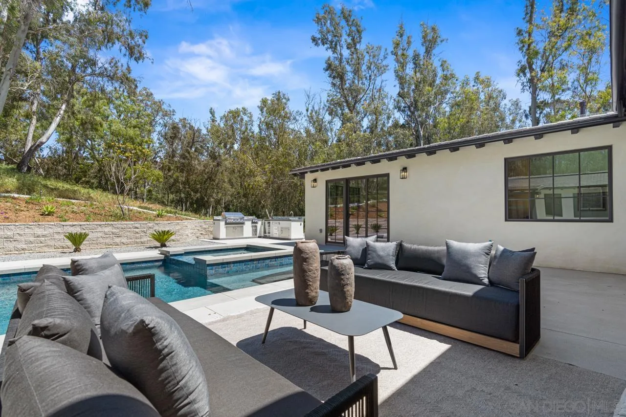 15245 El Camino Real Rancho Santa Fe, CA 92067 - Photo 38 of 41 a view of a patio with couches and potted plants