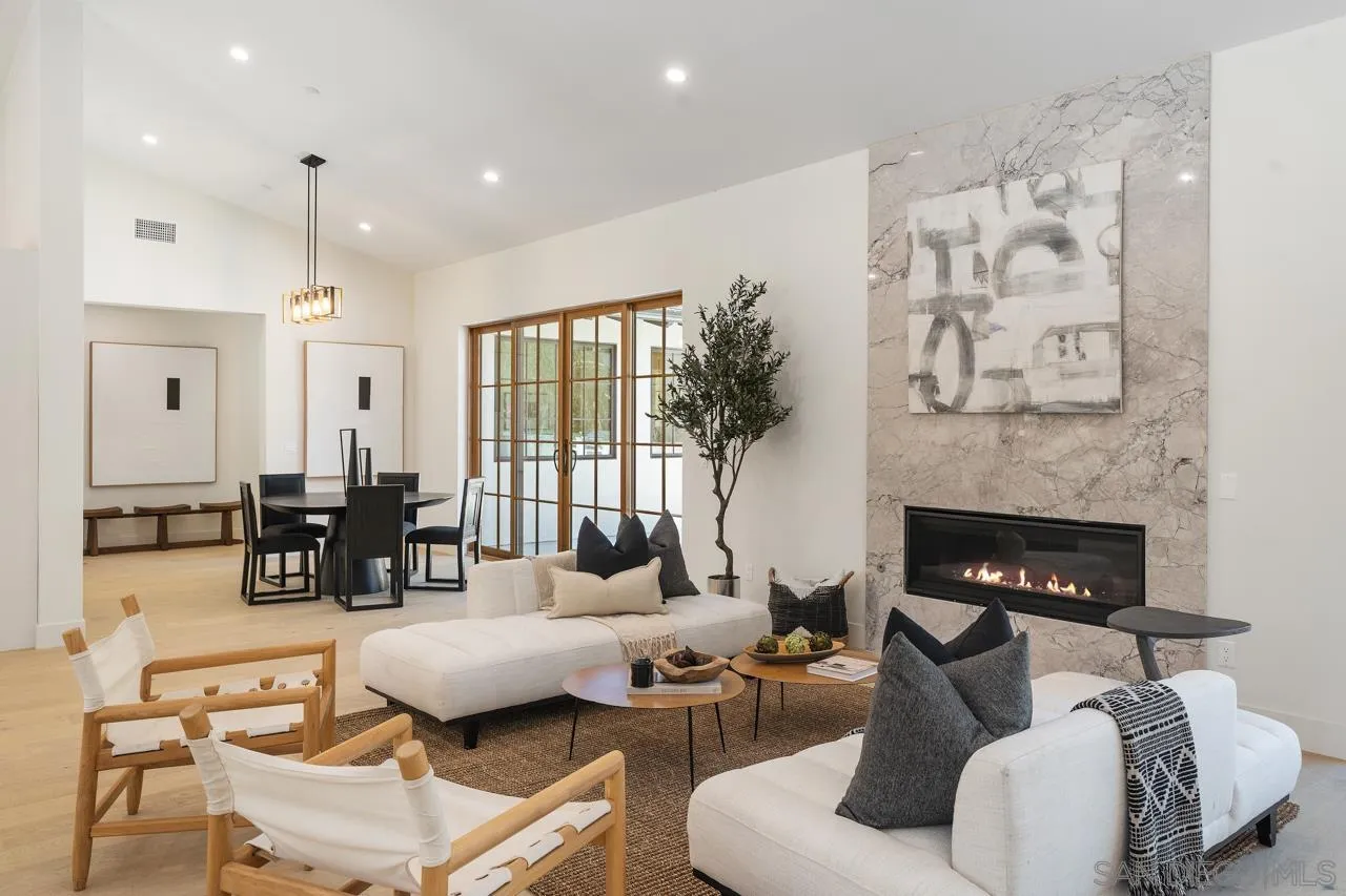 15245 El Camino Real Rancho Santa Fe, CA 92067 - Photo 8 of 41 a living room with furniture fireplace and window