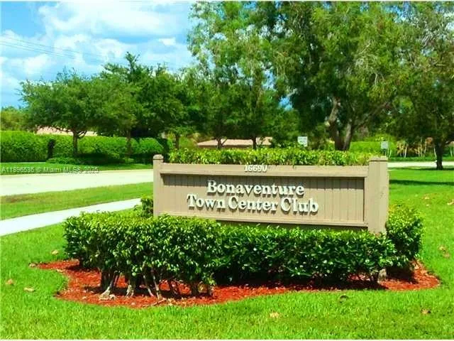 a view of a workspace with furniture