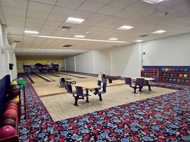 a lake view with a wooden fence