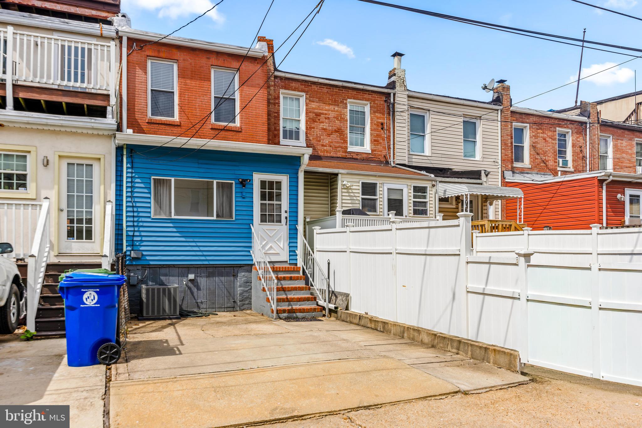 1243 Hull Street Baltimore, MD 21230 - Photo 39 of 39 a street view along with residential houses