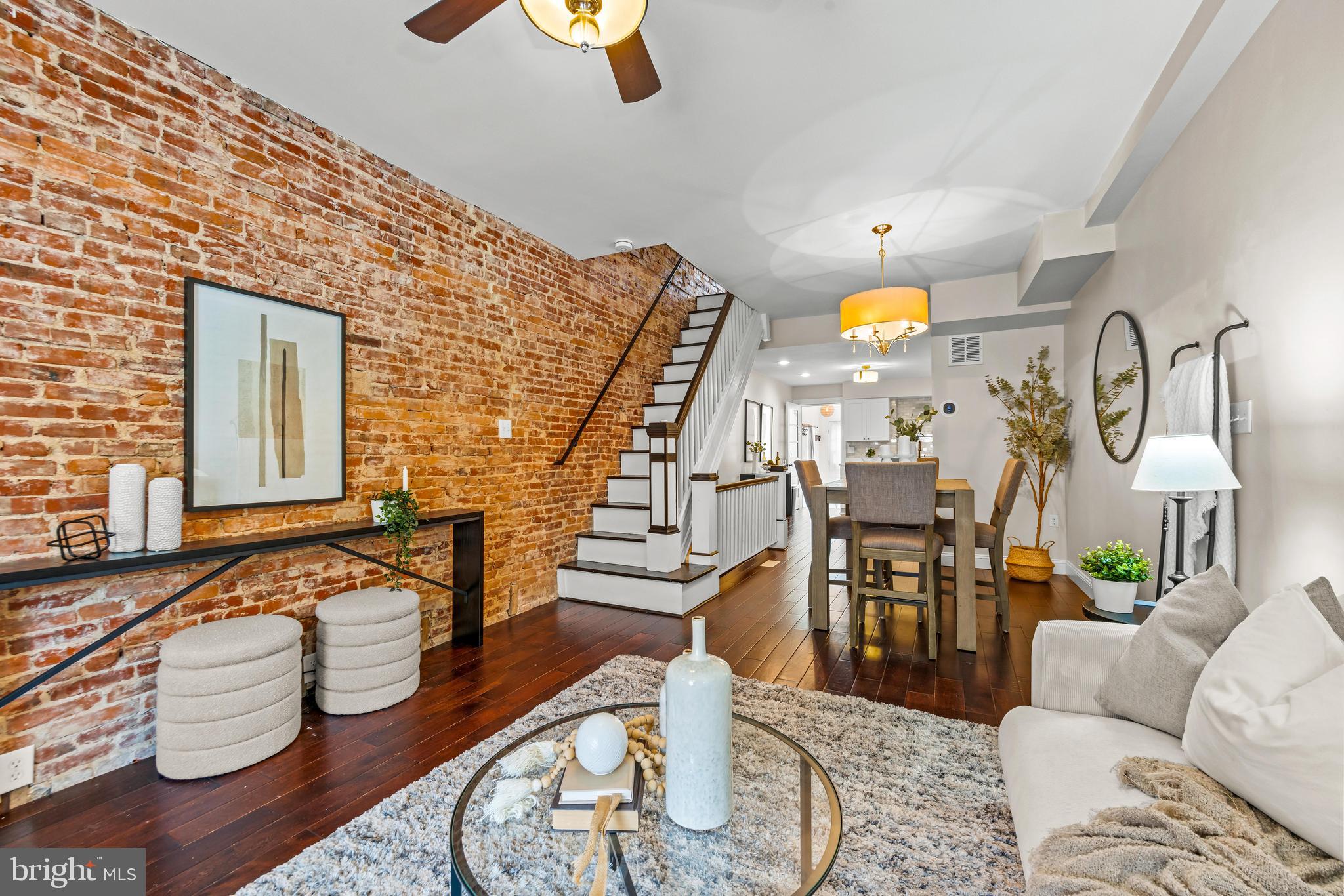 1243 Hull Street Baltimore, MD 21230 - Photo 4 of 39 a living room with furniture and wooden floor
