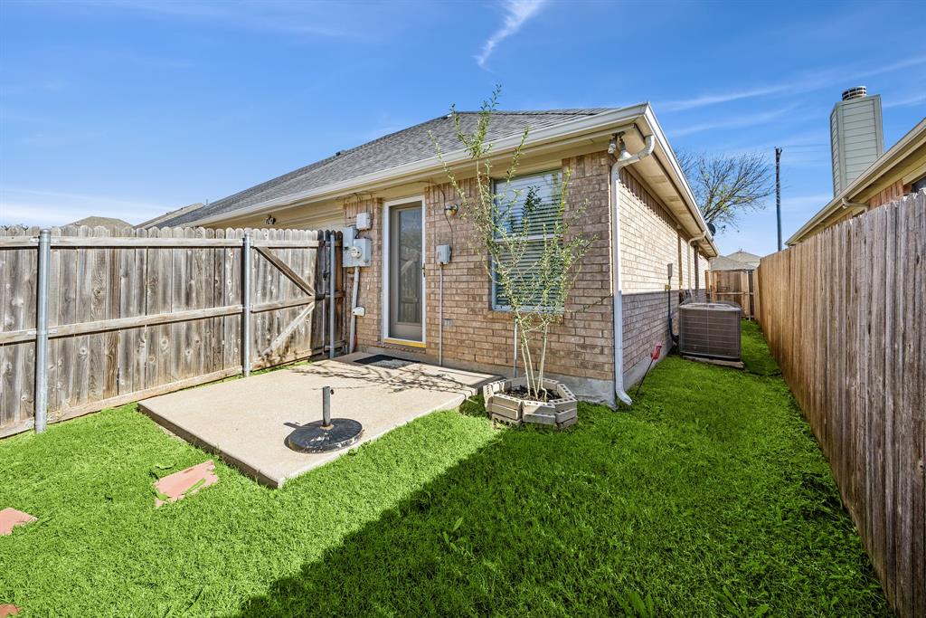 1747 Preston On The Lake Boulevard Little Elm, TX 75068 - Photo 22 of 23 a view of a house with backyard and porch