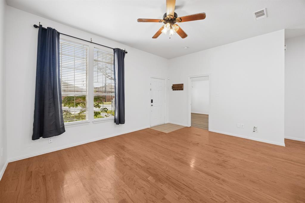 1747 Preston On The Lake Boulevard Little Elm, TX 75068 - Photo 4 of 23 a view of an empty room with a window