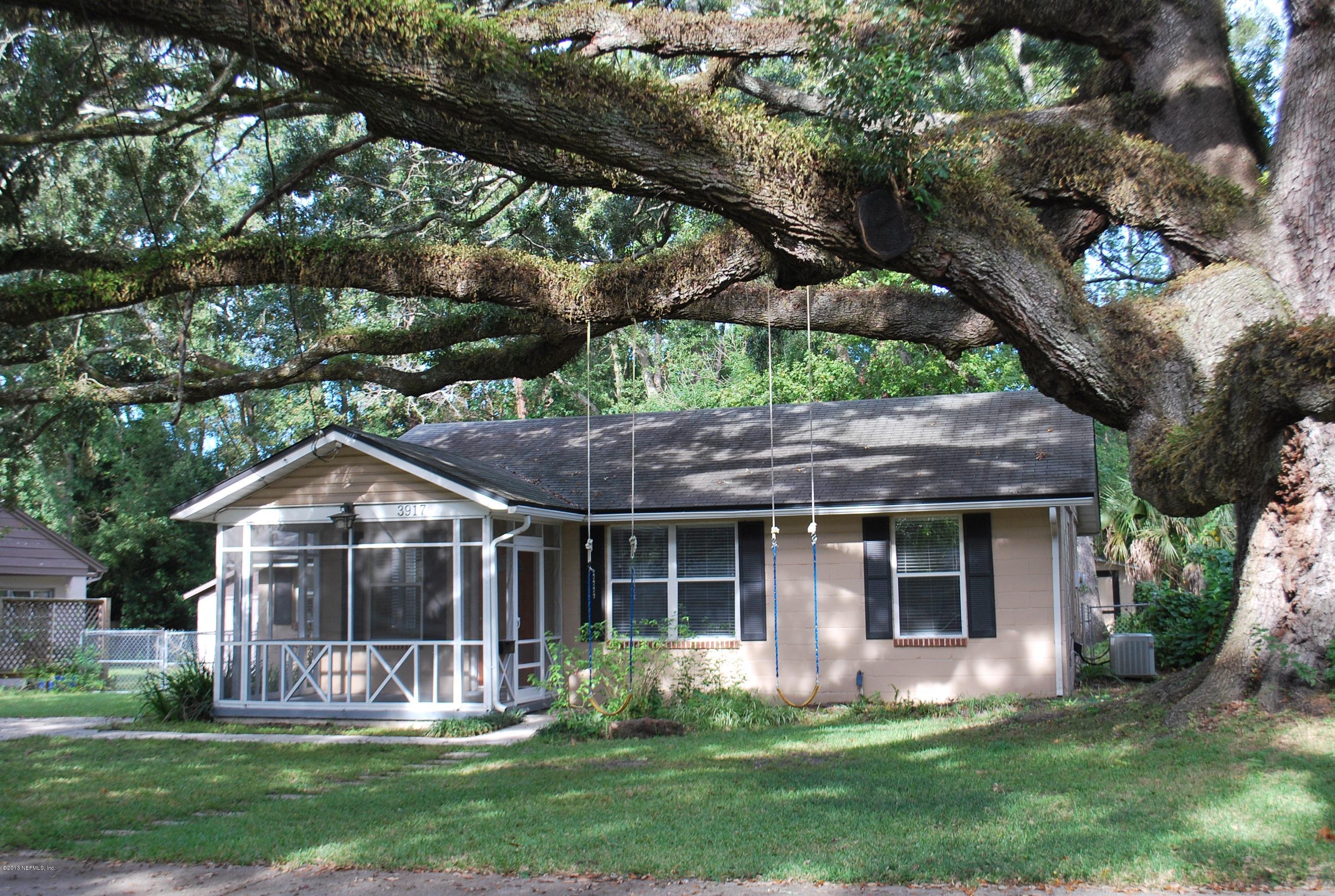 3917 Jean Street Jacksonville, FL 32205 - Photo 1 of 19 a front view of house with yard and green space