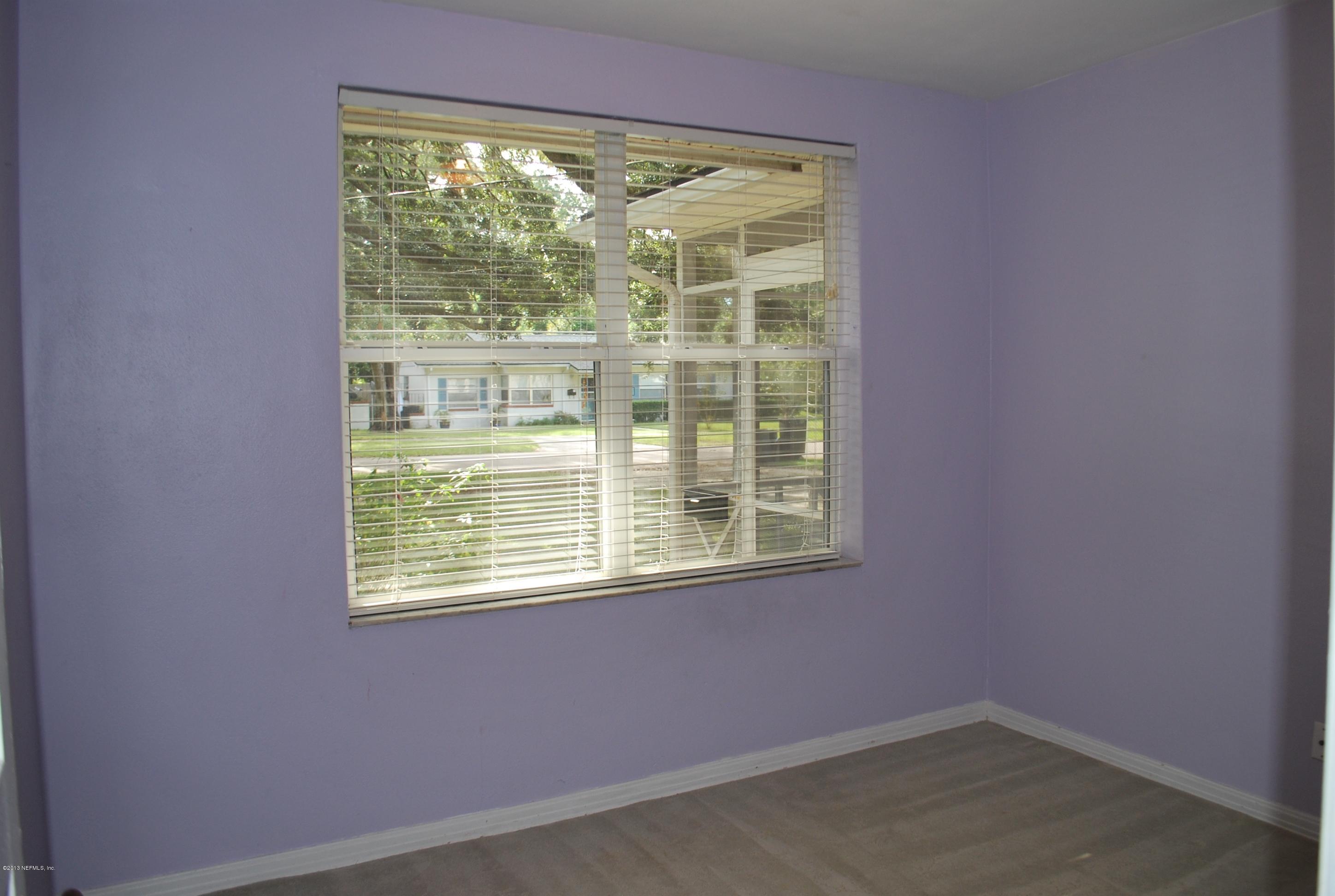 3917 Jean Street Jacksonville, FL 32205 - Photo 12 of 19 a view of an empty room with a window