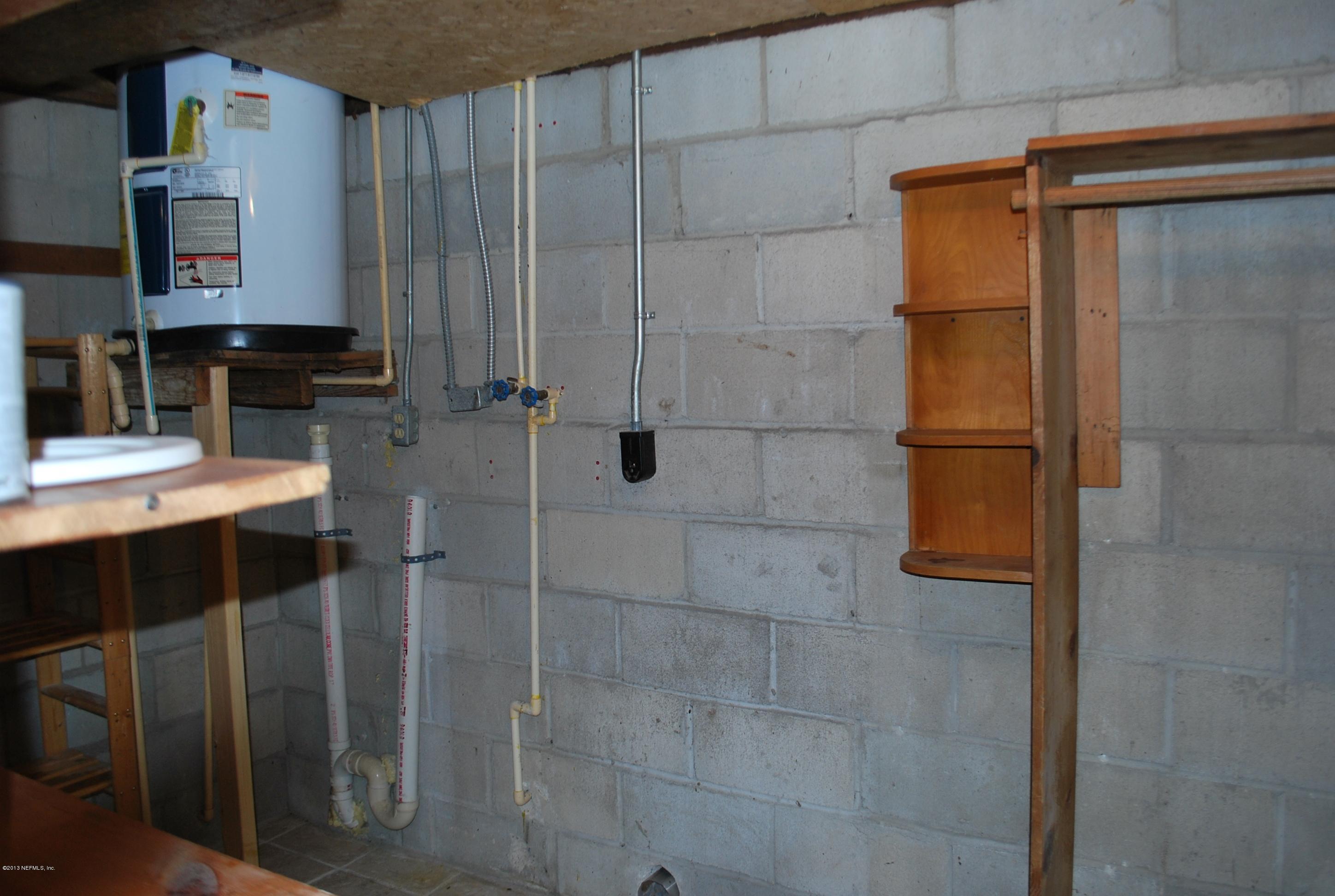 3917 Jean Street Jacksonville, FL 32205 - Photo 16 of 19 a bathroom with a shower