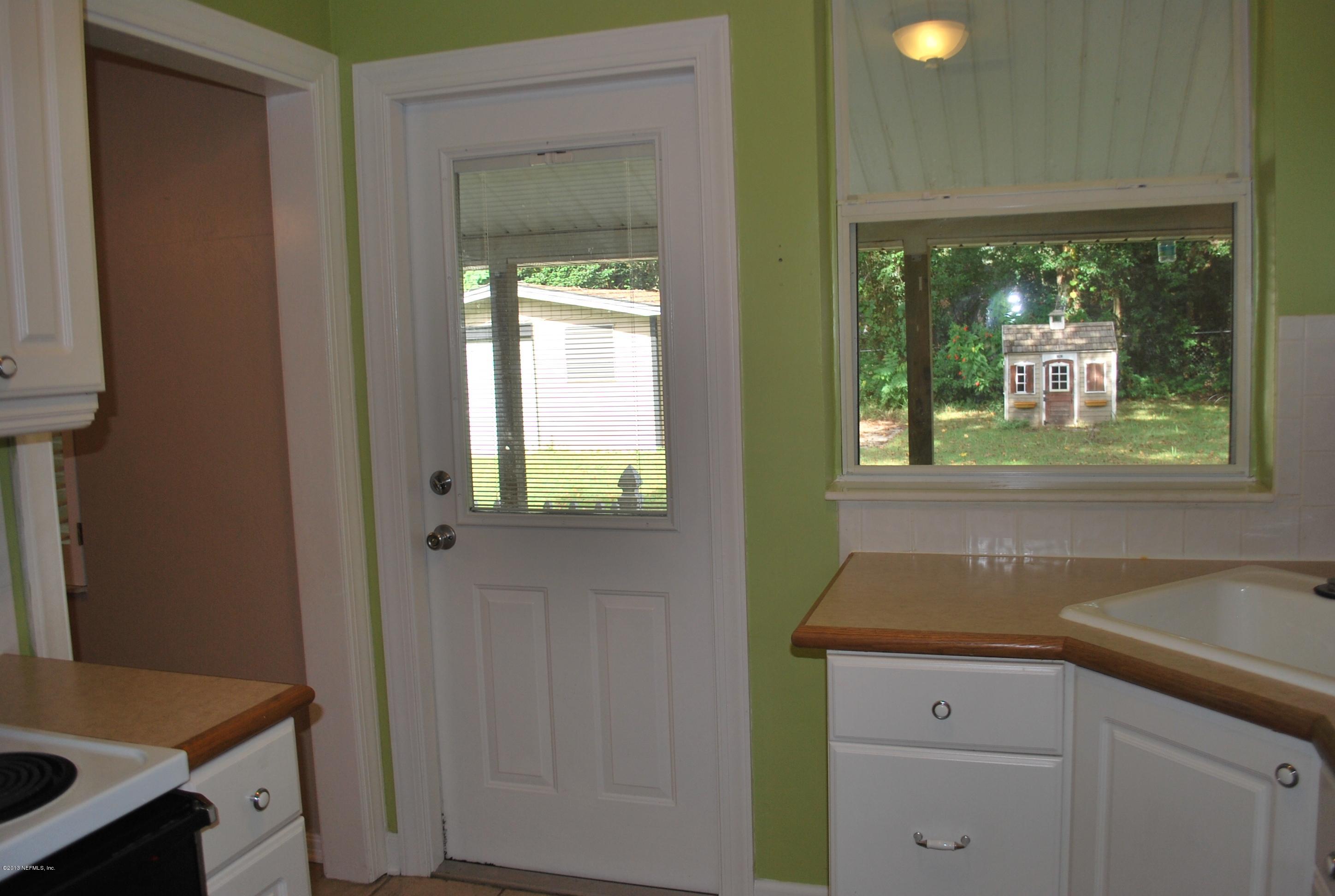 3917 Jean Street Jacksonville, FL 32205 - Photo 9 of 19 a sink with a window