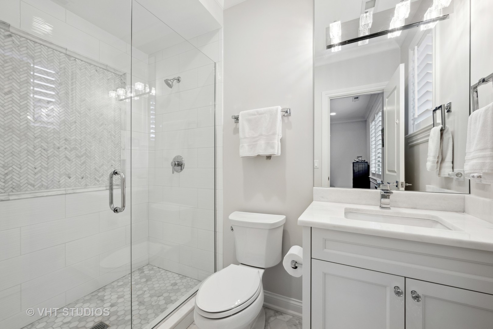 814 17th Street Wilmette, IL 60091 - Photo 28 of 51 a bathroom with a sink a toilet and shower