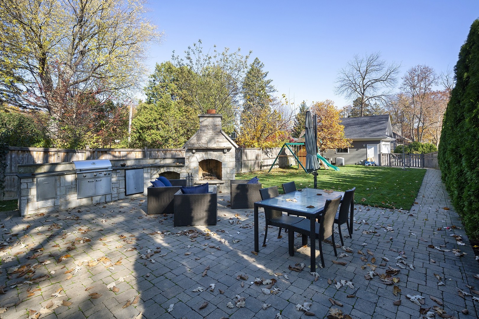 814 17th Street Wilmette, IL 60091 - Photo 45 of 51 a view of a patio with a table and chairs