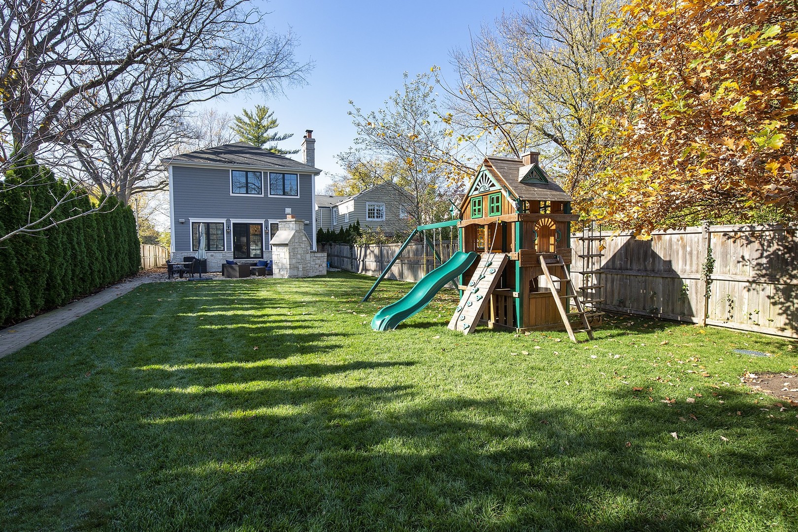 814 17th Street Wilmette, IL 60091 - Photo 46 of 51 a view of a house with a yard and trees