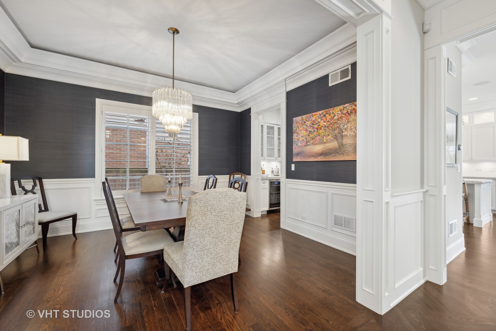 814 17th Street Wilmette, IL 60091 - Photo 7 of 51 a living room with furniture a flat screen tv and wooden floor